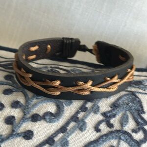 Leather handmade bracelet black and tan woven pattern adjustable very cool